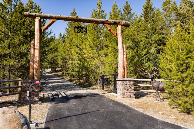 view of street featuring a gate