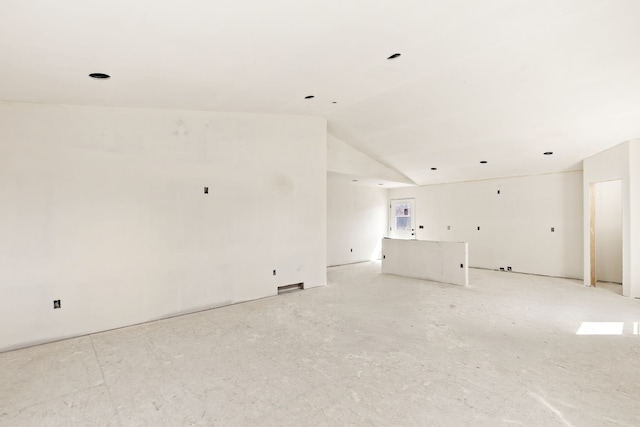 1503 3rd Ave NW, Great Falls, MT 59404 - unfurnished living room featuring vaulted ceiling