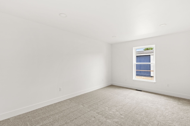 1503 3rd Ave NW, Great Falls, MT 59404 - empty room with carpet, baseboards, and recessed lighting