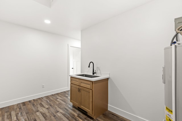 1503 3rd Ave NW, Great Falls, MT 59404 - bar area featuring a sink, dark wood-style flooring, baseboards, and recessed lighting