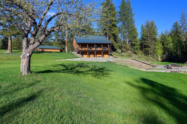 58386 Mt Highway 37, Rexford, MT 59930 - view of green lawn featuring a wooden deck