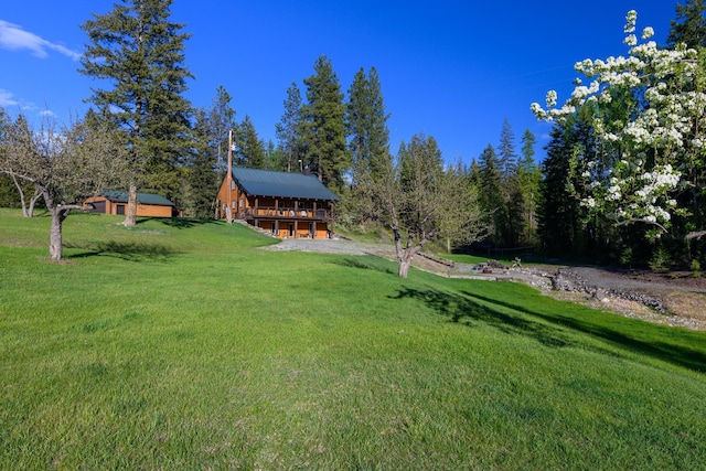 58386 Mt Highway 37, Rexford, MT 59930 - view of grassy yard featuring a deck