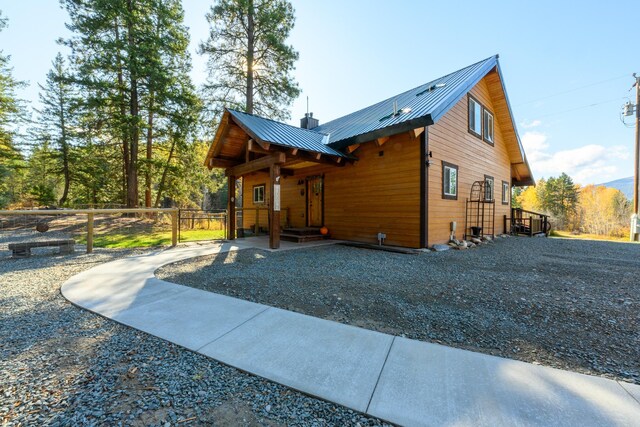 58386 Mt Highway 37, Rexford, MT 59930 - view of side of property with fence and metal roof