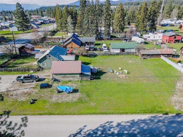 birds eye view of property featuring a mountain view