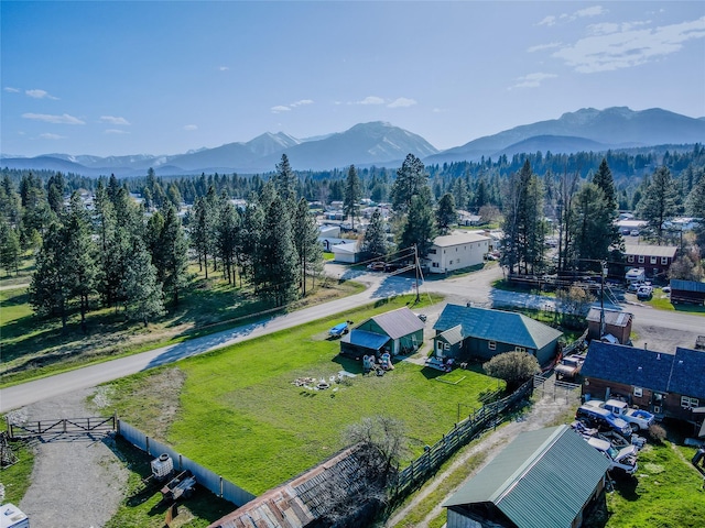 aerial view featuring a mountain view and a forest view