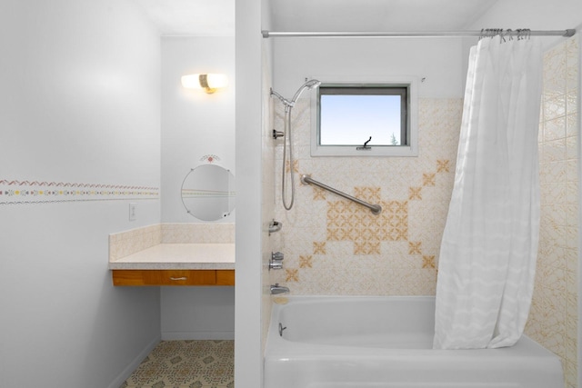 bathroom with shower / bathtub combination with curtain