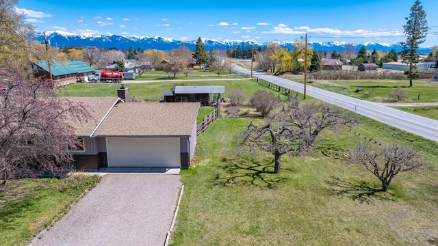 drone / aerial view featuring a mountain view