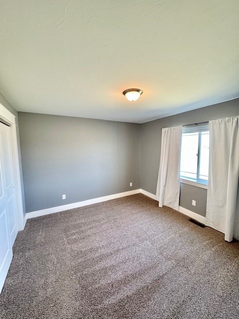 3554 Fasbender Ct, Helena, MT 59602 - carpeted empty room with baseboards