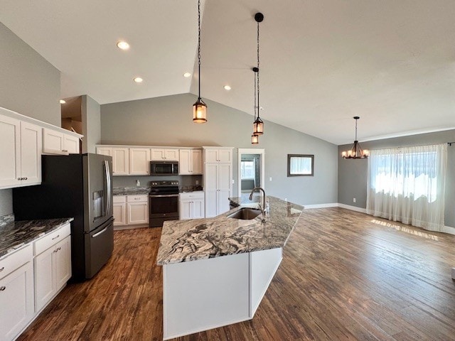 3554 Fasbender Ct, Helena, MT 59602 - kitchen with appliances with stainless steel finishes, a sink, white cabinetry, a chandelier, and high vaulted ceiling