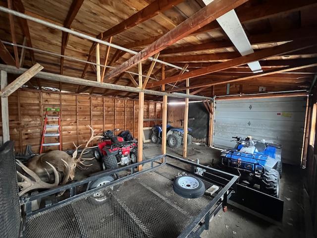 820 Lexington Ave, Butte, MT 59701 - back of house featuring roof with shingles, a chimney, and a yard