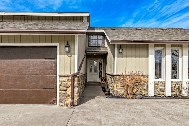 11 Wilson Butte Rd, Great Falls, MT 59405 - view of exterior entry featuring stone siding and roof with shingles