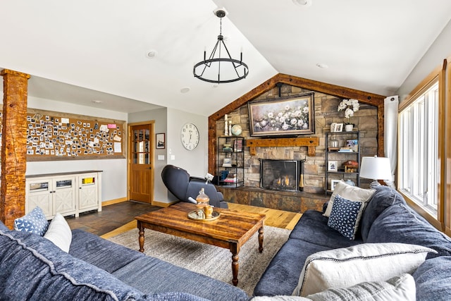 11 Wilson Butte Rd, Great Falls, MT 59405 - living area featuring lofted ceiling, a fireplace, baseboards, and a chandelier
