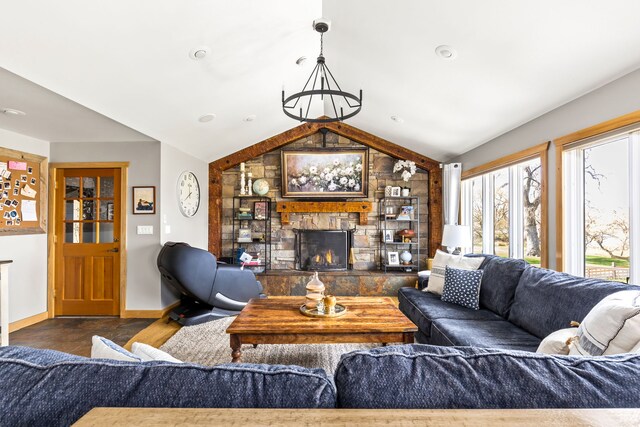11 Wilson Butte Rd, Great Falls, MT 59405 - living room with healthy amount of natural light, a fireplace, lofted ceiling, wood finished floors, and baseboards