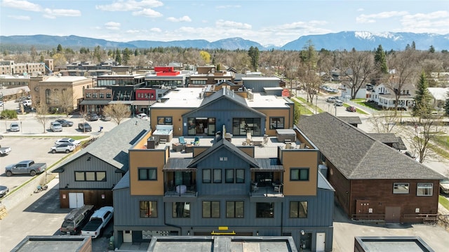 bird's eye view featuring a mountain view and a residential view