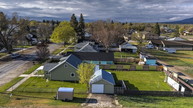 aerial view featuring a mountain view and a residential view