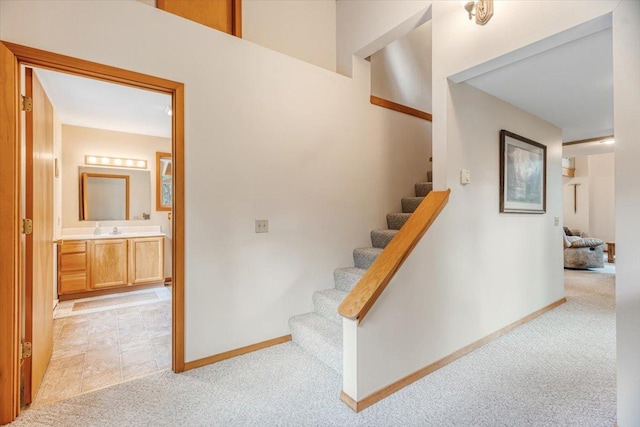 286 Antler Ridge Rd, Whitefish, MT 59937 - staircase featuring carpet flooring and baseboards