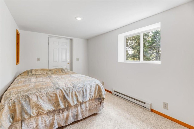 286 Antler Ridge Rd, Whitefish, MT 59937 - bedroom with a baseboard radiator, carpet floors, and recessed lighting