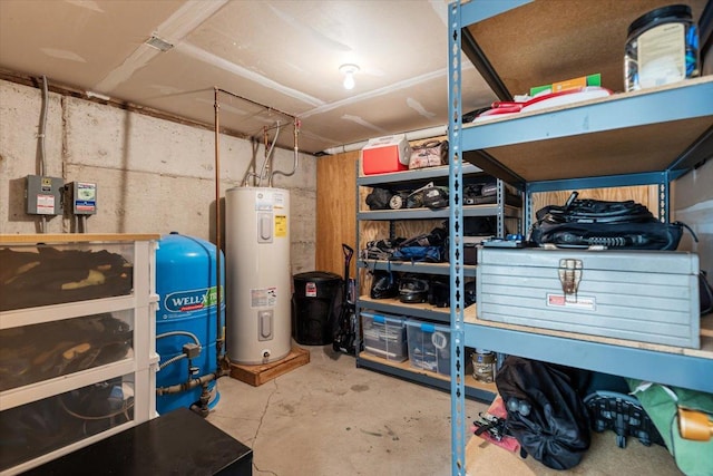 storage area featuring electric water heater