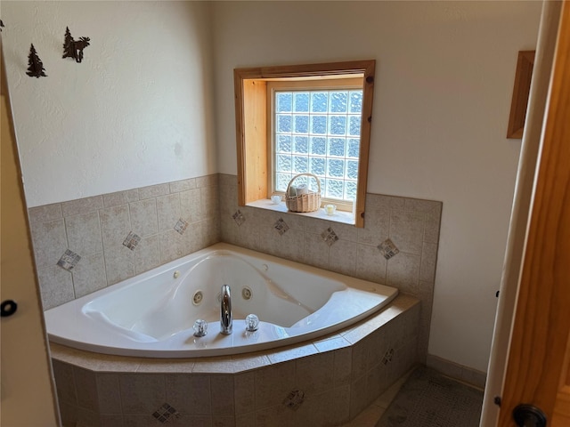 bathroom featuring a whirlpool tub