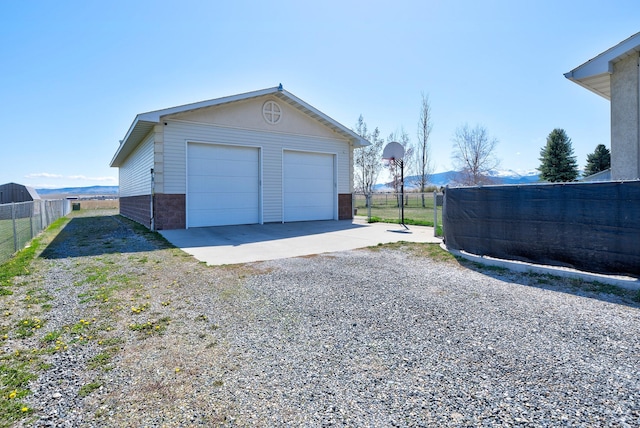 detached garage with fence