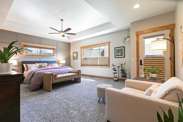 1207 Creek Crossing Rd, Missoula, MT 59802 - carpeted bedroom with a raised ceiling, a ceiling fan, and recessed lighting