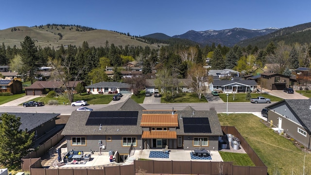 1207 Creek Crossing Rd, Missoula, MT 59802 - aerial perspective of suburban area with a mountain backdrop