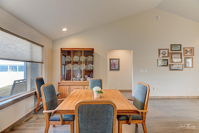 3875 Saint Marys Rd, East Helena, MT 59635 - dining area featuring lofted ceiling, wood finished floors, and recessed lighting