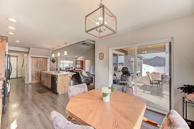 3875 Saint Marys Rd, East Helena, MT 59635 - dining room featuring a ceiling fan, dark wood-style flooring, vaulted ceiling, recessed lighting, and a chandelier