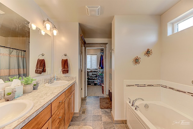 3875 Saint Marys Rd, East Helena, MT 59635 - bathroom with a bath, double vanity, and a shower with curtain