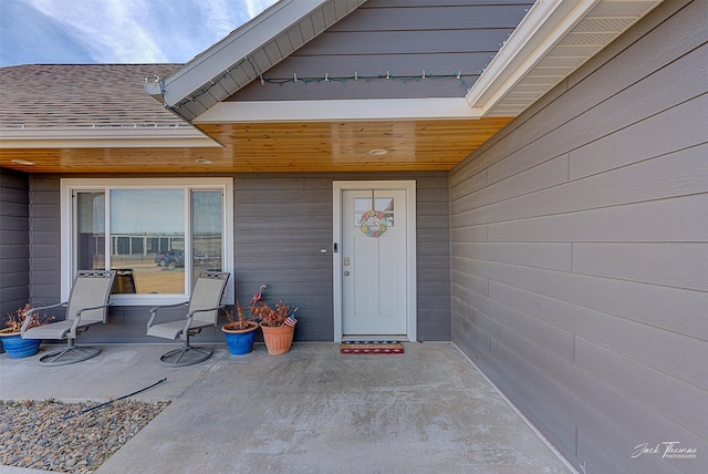 3875 Saint Marys Rd, East Helena, MT 59635 - property entrance featuring a patio and roof with shingles