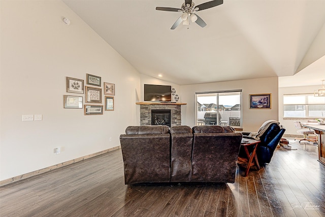 3875 Saint Marys Rd, East Helena, MT 59635 - living area with vaulted ceiling, dark wood finished floors, a ceiling fan, a stone fireplace, and a chandelier