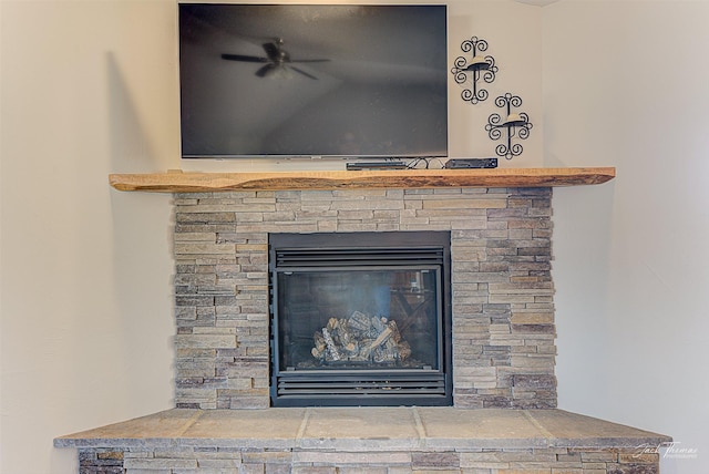 3875 Saint Marys Rd, East Helena, MT 59635 - detailed view of a ceiling fan and a stone fireplace