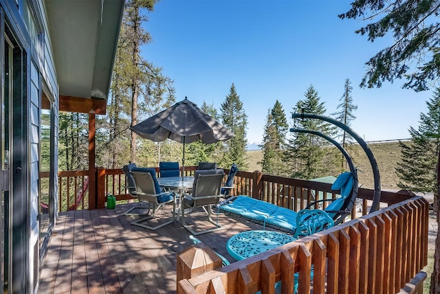 103 Tamarack Woods Dr, Lakeside, MT 59922 - deck with outdoor dining area