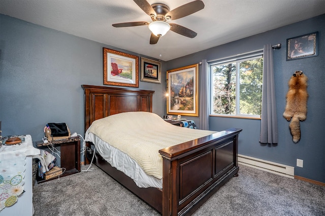 103 Tamarack Woods Dr, Lakeside, MT 59922 - bedroom featuring baseboards, a baseboard radiator, carpet flooring, and ceiling fan