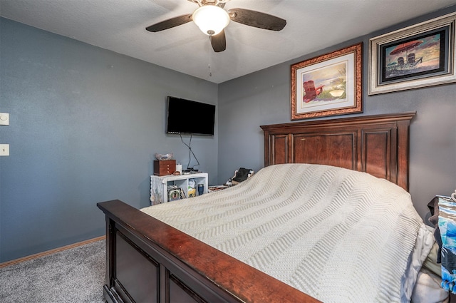 103 Tamarack Woods Dr, Lakeside, MT 59922 - carpeted bedroom with baseboards and ceiling fan