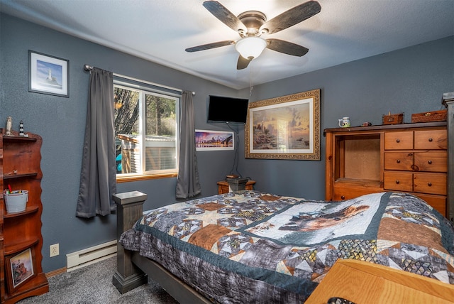 103 Tamarack Woods Dr, Lakeside, MT 59922 - bedroom featuring a ceiling fan, baseboards, baseboard heating, and carpet flooring