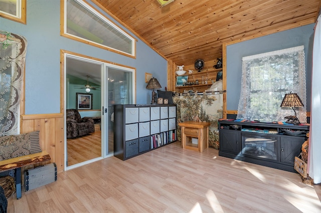 103 Tamarack Woods Dr, Lakeside, MT 59922 - interior space with wood finished floors, wooden ceiling, a wainscoted wall, lofted ceiling, and wooden walls