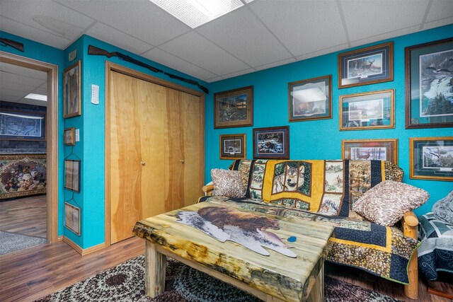 103 Tamarack Woods Dr, Lakeside, MT 59922 - sitting room with a drop ceiling and wood finished floors