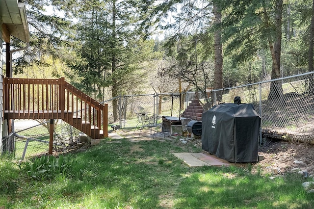 103 Tamarack Woods Dr, Lakeside, MT 59922 - view of yard with stairs and a fenced backyard