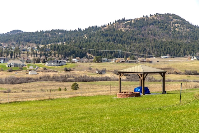 mountain view with a view of trees and a rural view