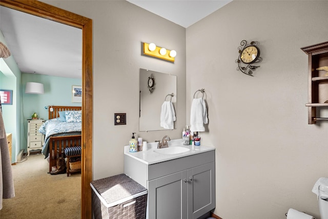 bathroom featuring connected bathroom and vanity