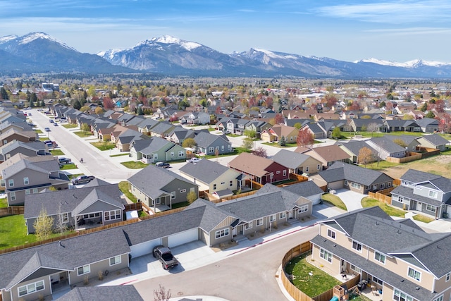 drone / aerial view with a mountain view and a residential view