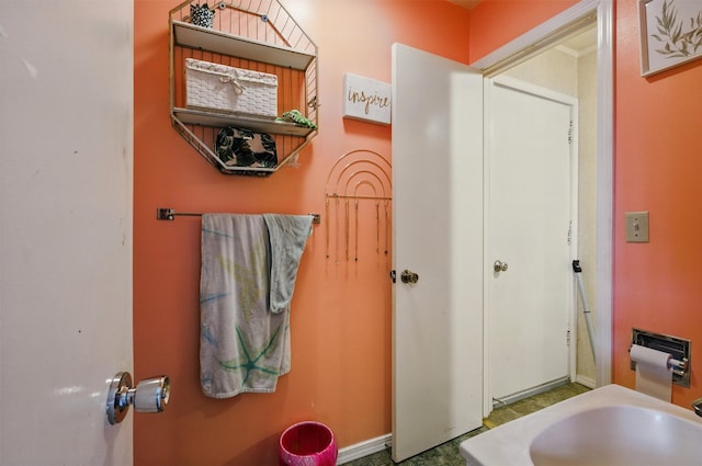 bathroom featuring baseboards