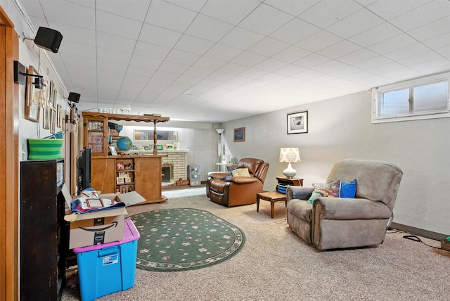 interior space featuring carpet flooring and a fireplace