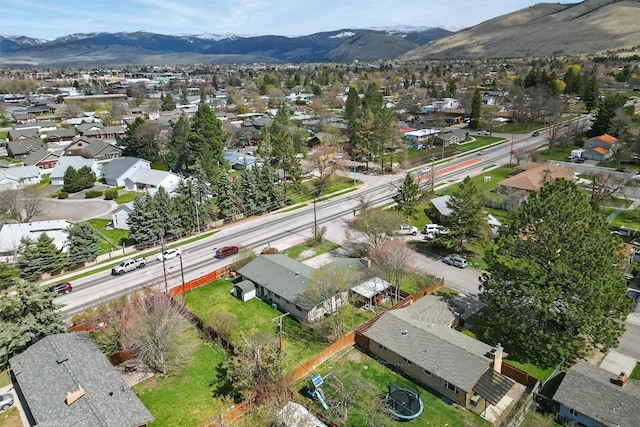 aerial view featuring a mountain view and a residential view