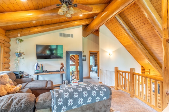 living area with visible vents, ceiling fan, wooden ceiling, lofted ceiling with beams, and carpet
