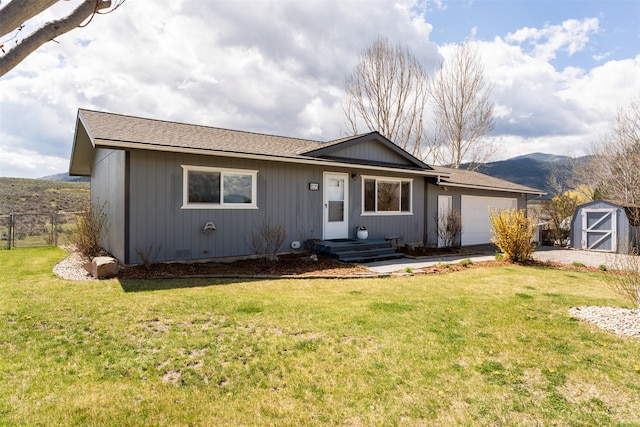 9225 Sharptail Dr, Missoula, MT 59808 - ranch-style house featuring a garage and a mountain view
