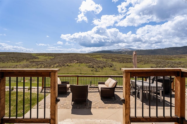 9225 Sharptail Dr, Missoula, MT 59808 - wooden terrace featuring a mountain view