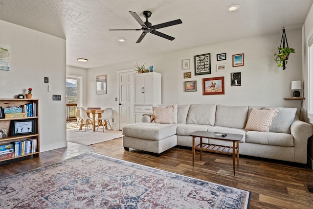 9225 Sharptail Dr, Missoula, MT 59808 - living room with wood finished floors, recessed lighting, ceiling fan, and baseboards