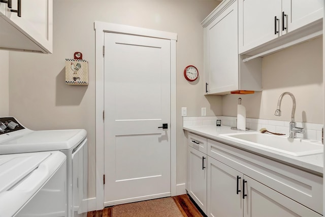 11469 Ninebark Way, Missoula, MT 59802 - washroom featuring cabinet space, washing machine and clothes dryer, and dark wood-style floors